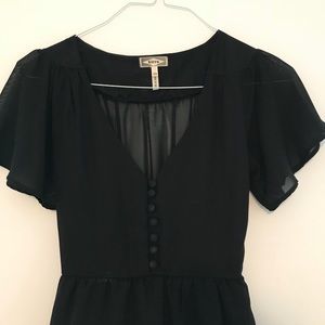 Black flutter sleeve dress